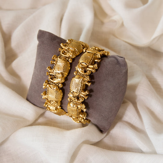 Temple Elephant Carved Gold Tone Bangle Set of 2